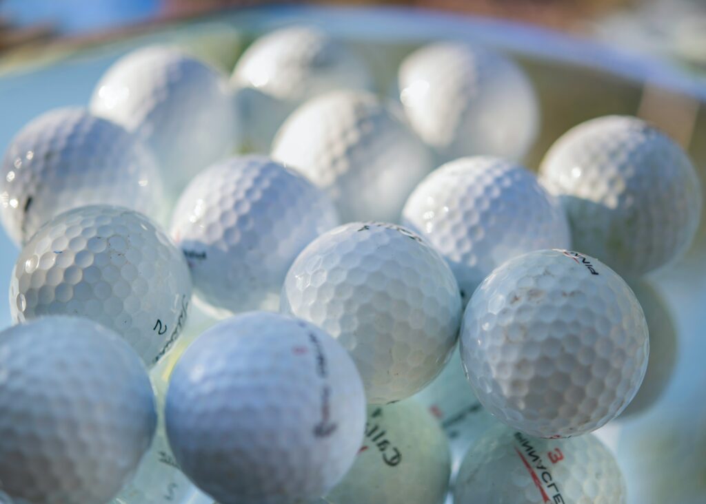 The Best Golf Balls for High Handicappers: A Comprehensive Guide - Lots of balls on the ground